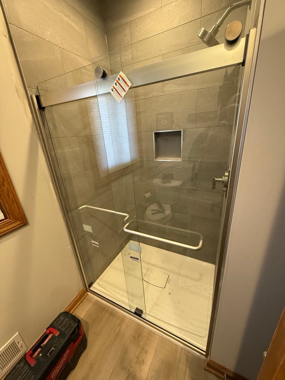 Bathroom remodel — glass shower door installation